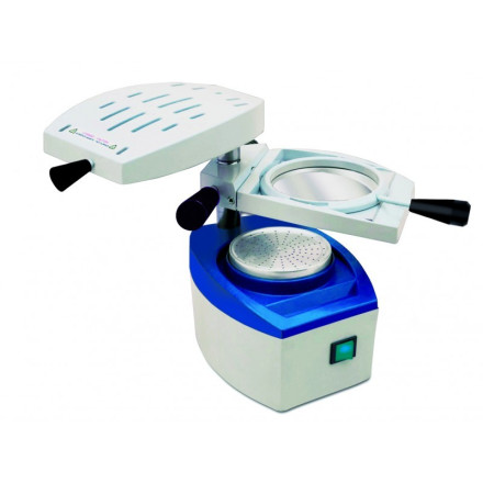 VACUUM FORMING MACHINE